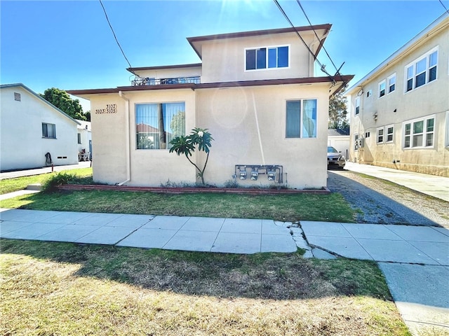 exterior space featuring a lawn