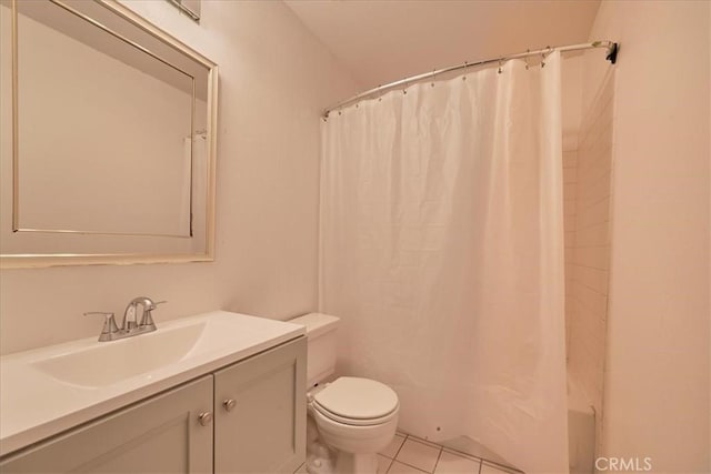 full bathroom featuring tile patterned flooring, vanity, shower / bath combo, and toilet