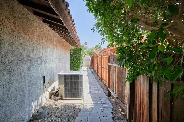 view of property exterior with central AC unit