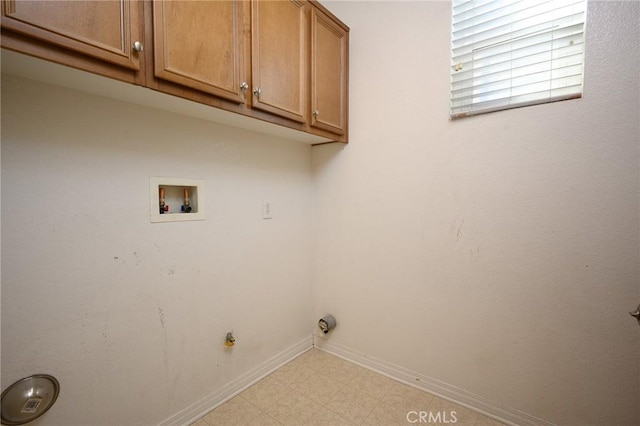 laundry area with washer hookup, hookup for a gas dryer, and cabinets