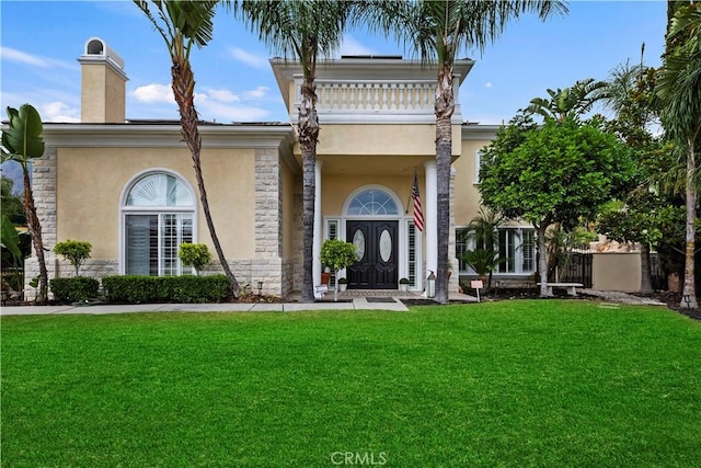 view of front of house with a front yard