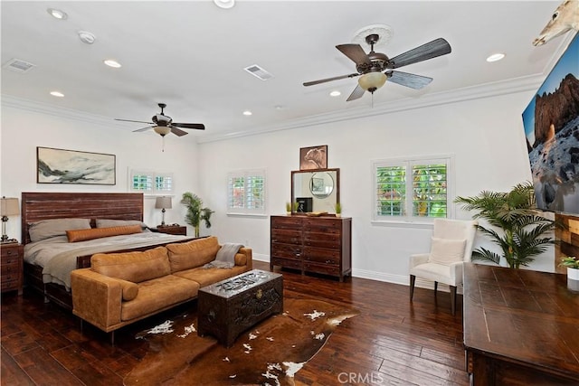 bedroom featuring ornamental molding, ceiling fan, and dark hardwood / wood-style flooring