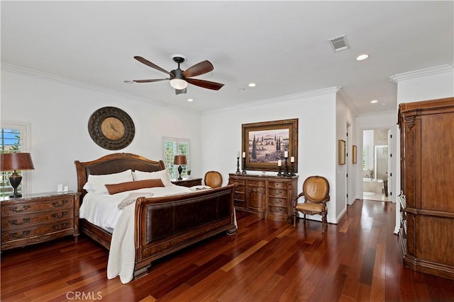 bedroom with crown molding, ensuite bath, ceiling fan, multiple windows, and dark hardwood / wood-style flooring