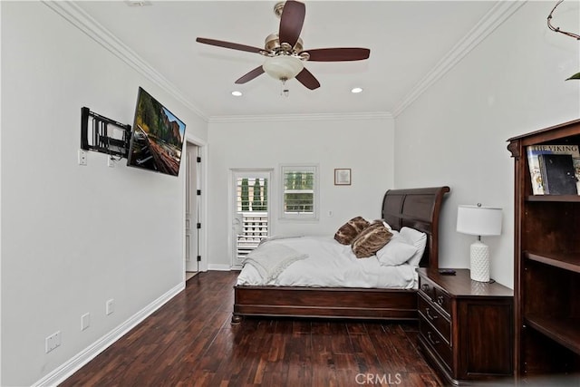 bedroom with crown molding, dark hardwood / wood-style floors, and ceiling fan