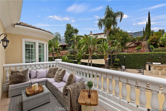 balcony featuring a mountain view