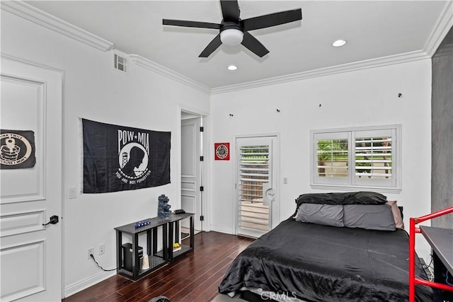 bedroom with ceiling fan, ornamental molding, and dark hardwood / wood-style floors