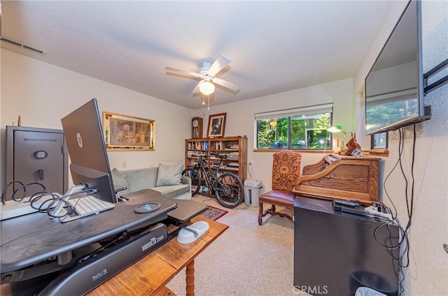 office space with ceiling fan