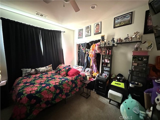 carpeted bedroom with ceiling fan