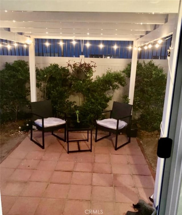 view of patio at twilight