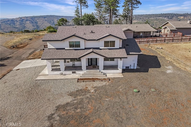 view of front facade featuring a mountain view