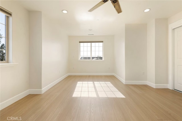 unfurnished room featuring recessed lighting, ceiling fan, light wood-type flooring, and baseboards