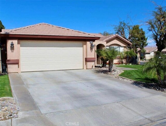 single story home with a garage