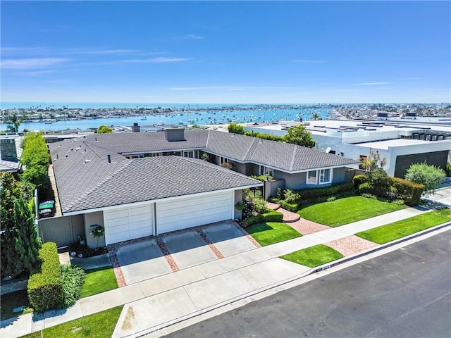 aerial view featuring a water view