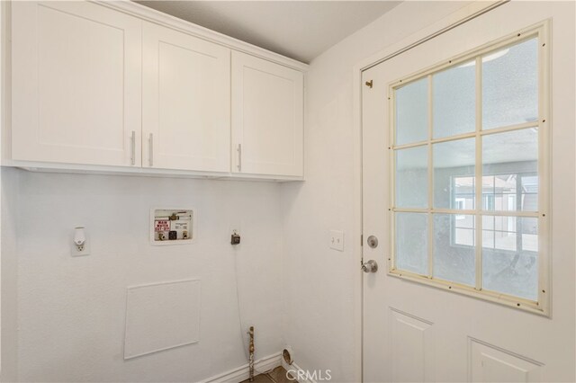 laundry room with washer hookup, cabinets, and hookup for an electric dryer