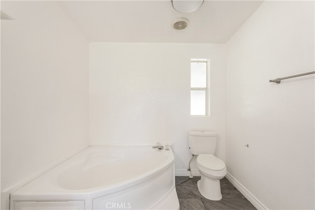 full bath with toilet, baseboards, and a bath