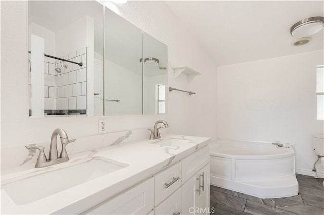 full bathroom with lofted ceiling, a sink, and a bath