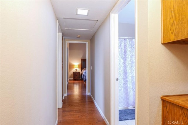 hallway featuring hardwood / wood-style floors