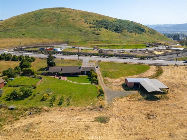 birds eye view of property featuring a rural view and a mountain view