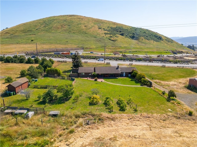 birds eye view of property featuring a rural view and a mountain view