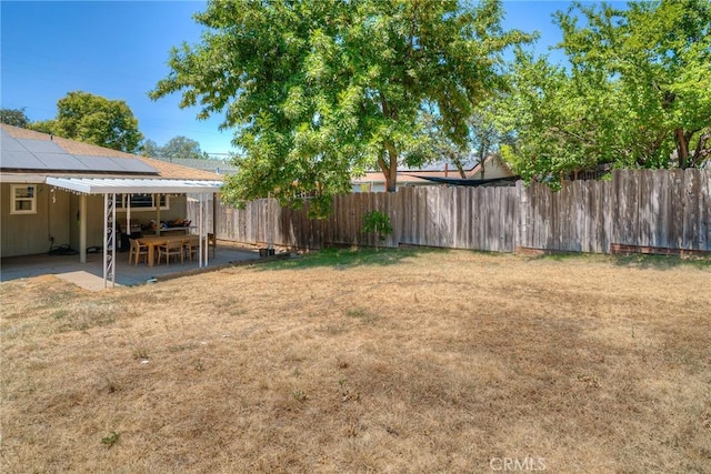 view of yard with a patio area
