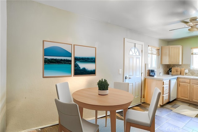 dining area with ceiling fan