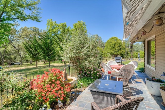 view of patio with a grill