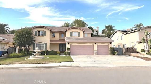 view of front of property with a garage