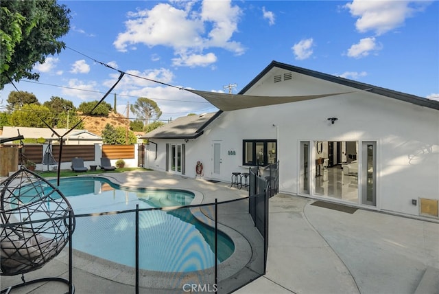 view of pool featuring a patio area