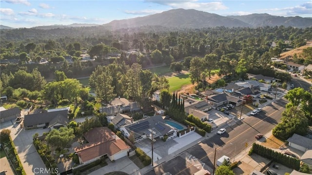 aerial view featuring a mountain view and a residential view