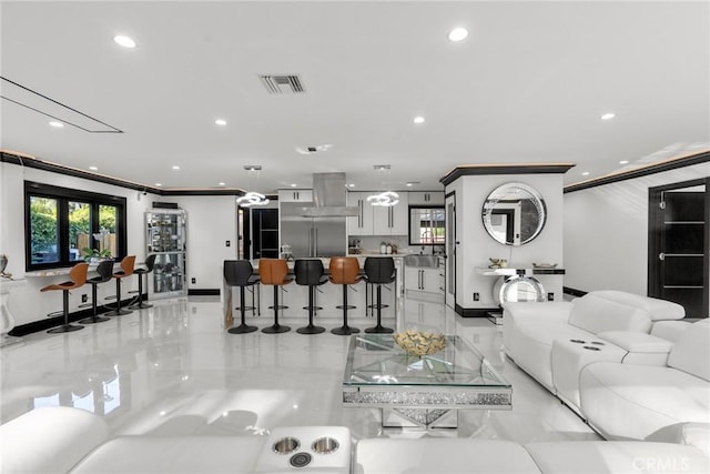 living area with crown molding, baseboards, recessed lighting, and visible vents