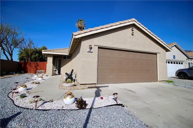 single story home featuring a garage