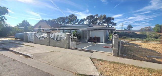 view of front of property with a garage