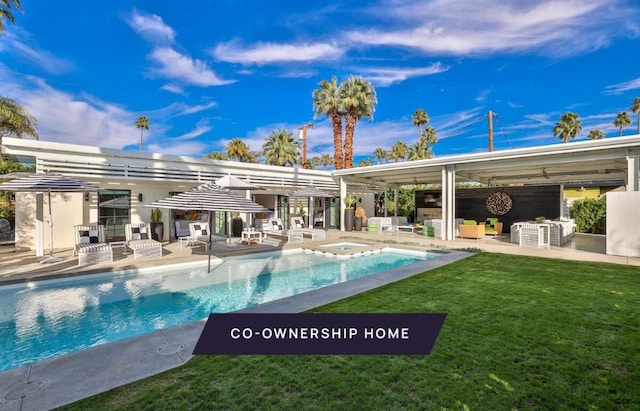 view of swimming pool with an in ground hot tub, a patio area, and a yard