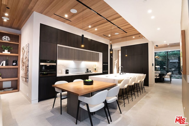 dining room featuring wooden ceiling