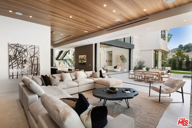 living room with wooden ceiling