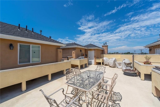 637 S Grand Ave Unit 4, San Pedro, CA 90731 - view of patio featuring an outdoor fire pit