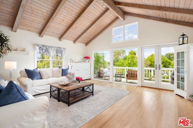 living room with french doors, light hardwood / wood-style flooring, wooden ceiling, and a healthy amount of sunlight