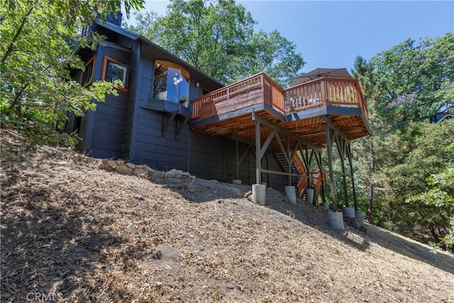 1384 Golden Rule Ln, Lake Arrowhead, CA 92352 - rear view of house with a deck