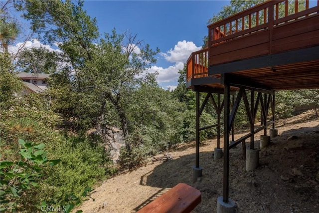 view of yard featuring a deck