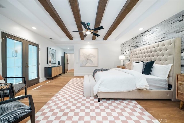 bedroom with french doors, ceiling fan, access to exterior, beam ceiling, and light hardwood / wood-style floors