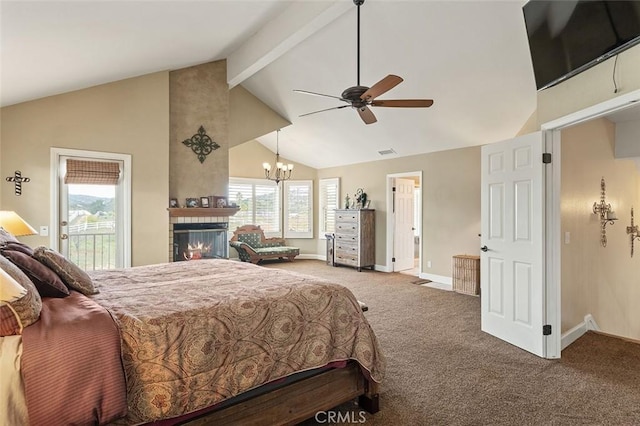 bedroom featuring ceiling fan with notable chandelier, beamed ceiling, a large fireplace, access to outside, and carpet flooring