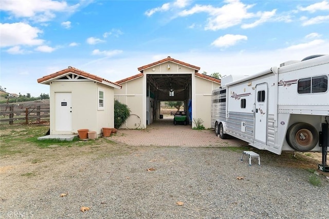 exterior space featuring a shed