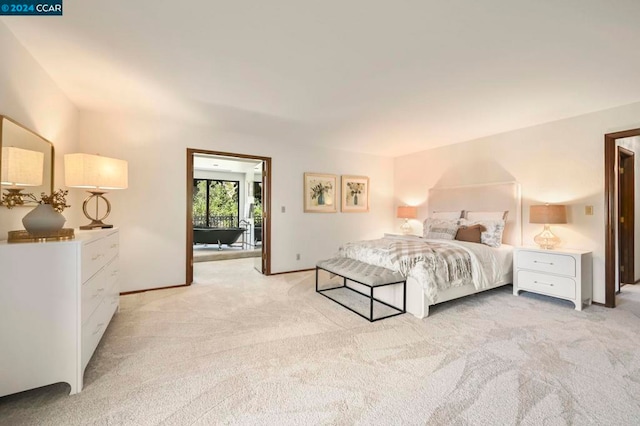 bedroom featuring light colored carpet