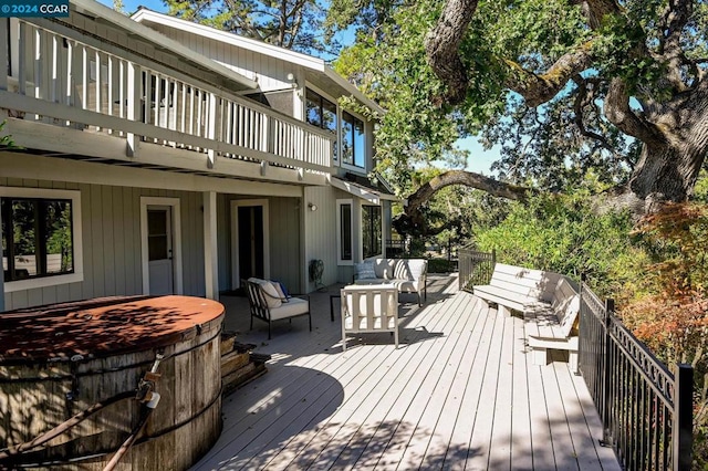 deck with an outdoor hangout area