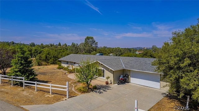 view of front of house with a garage