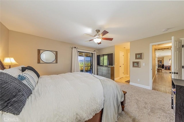 bedroom featuring light carpet, access to outside, and ceiling fan