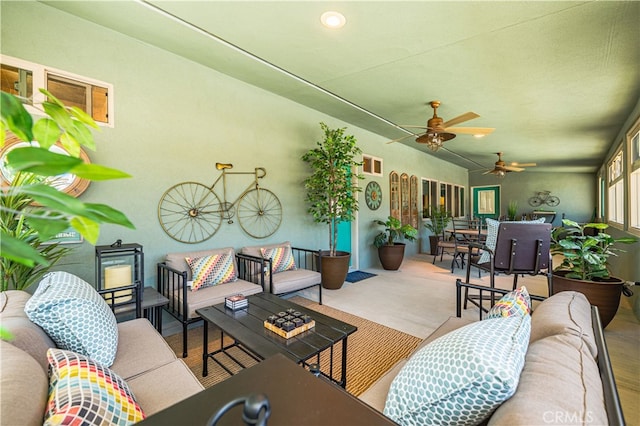 view of patio / terrace featuring ceiling fan and outdoor lounge area