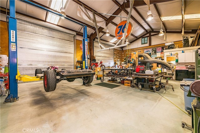 garage with a workshop area