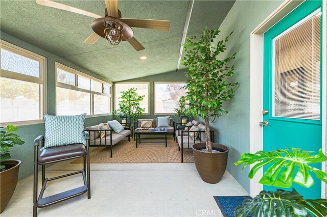 sunroom / solarium with vaulted ceiling and ceiling fan