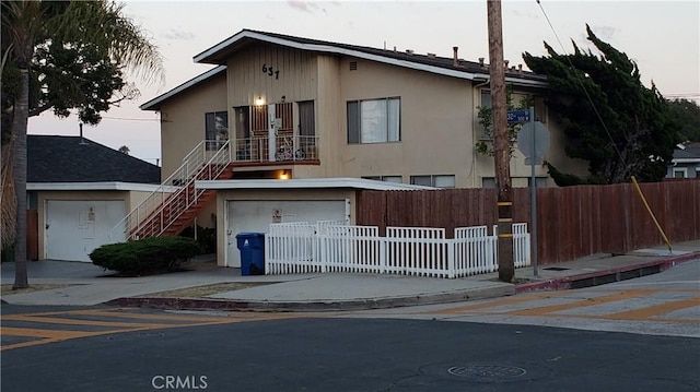 view of front of property featuring a garage